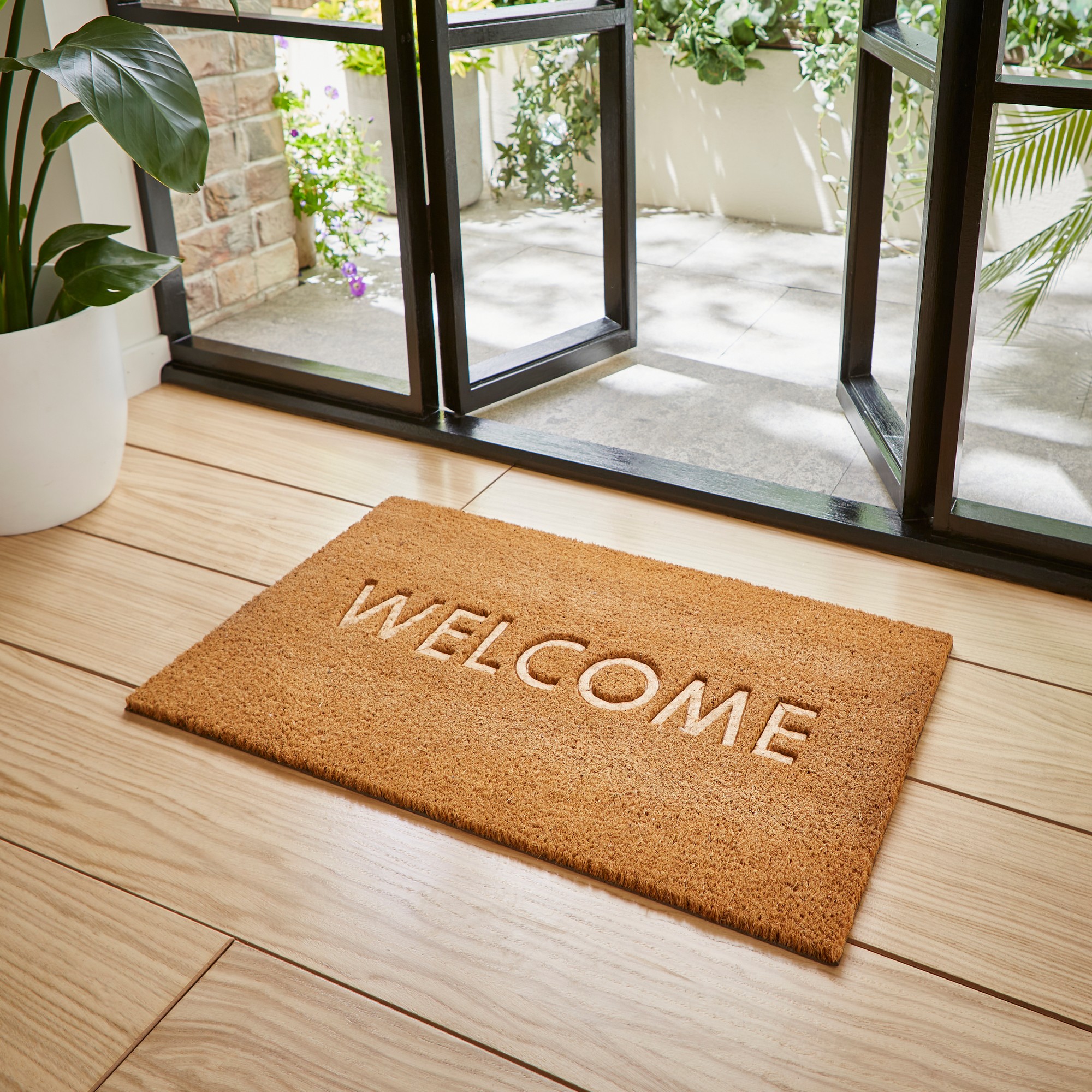 Welcome Embossed Coir Doormat Utility Doormat In Natural